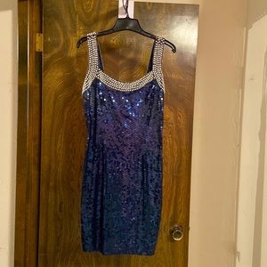 Beautiful, beaded, open squared back short dress.